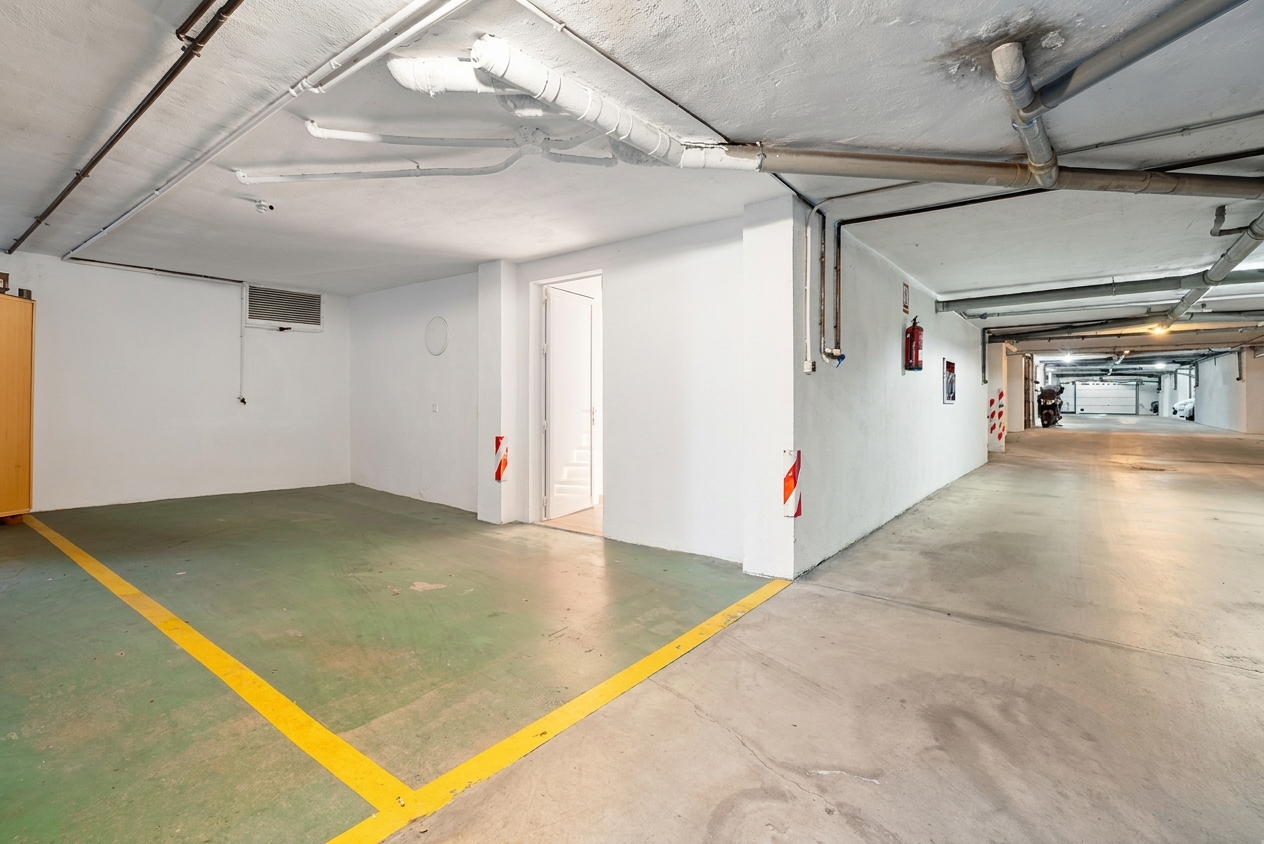 Private underground parking space with direct door into the house